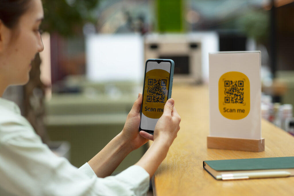 Customer scanning a QR code on a phone